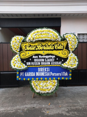 Papan Bunga Duka di Tajinan